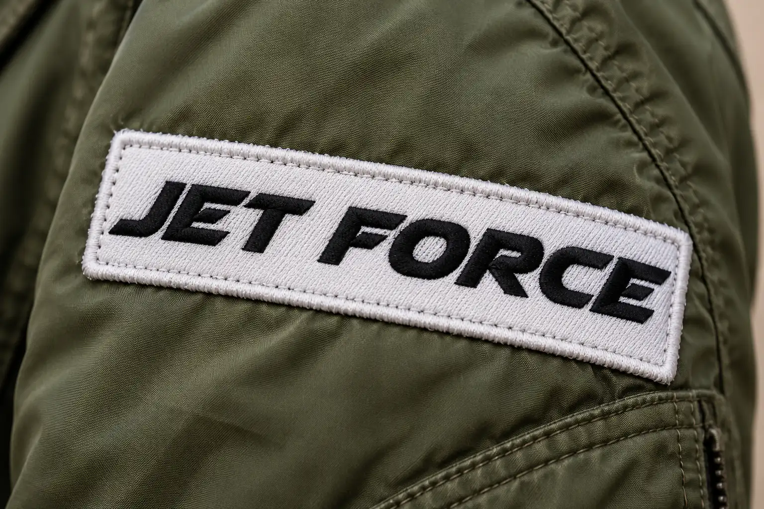 Airstrike font on a flight jacket patch reading JET FORCE