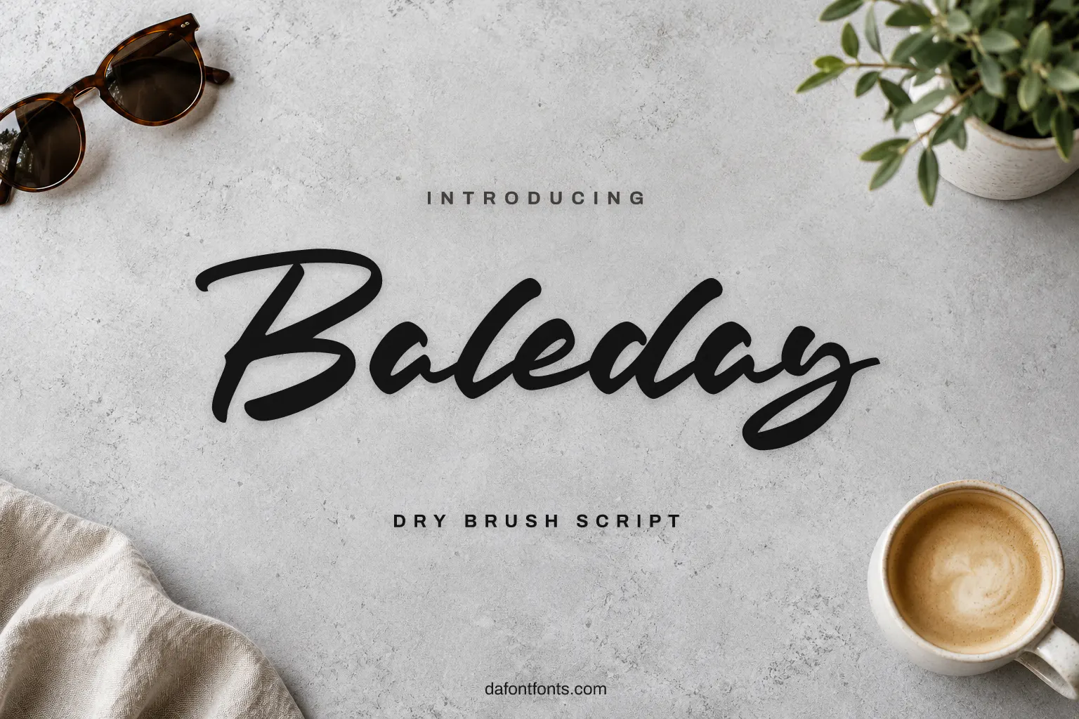 Baleday font poster: black brush script on a light concrete background