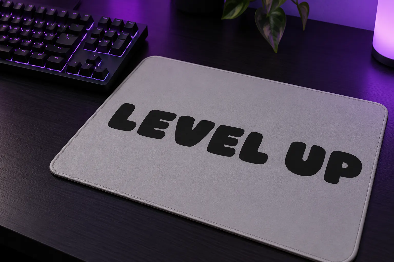 Bounce Dash font on a gaming mousepad reading LEVEL UP