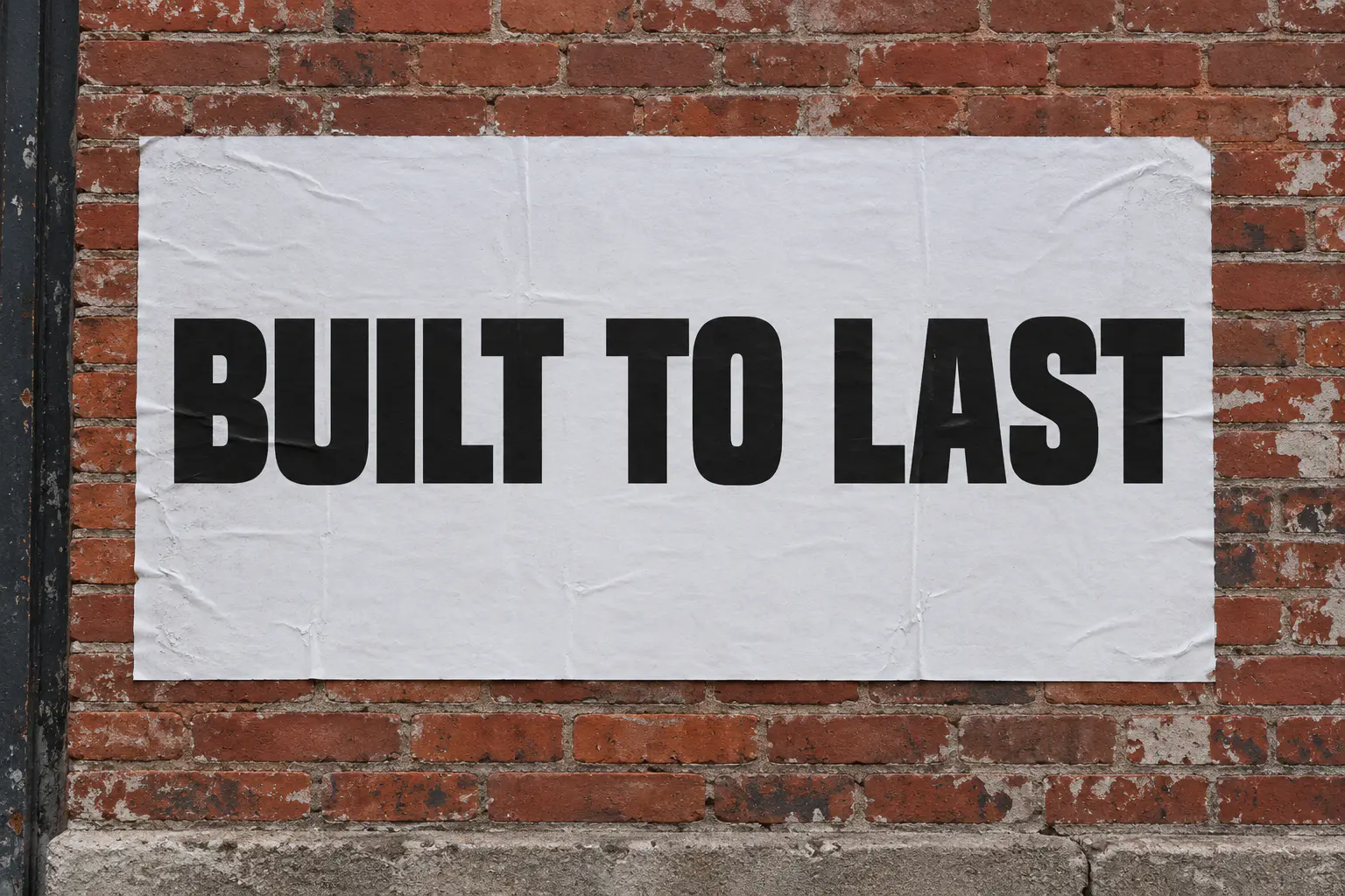 Built Titling font on a street poster reading BUILT TO LAST