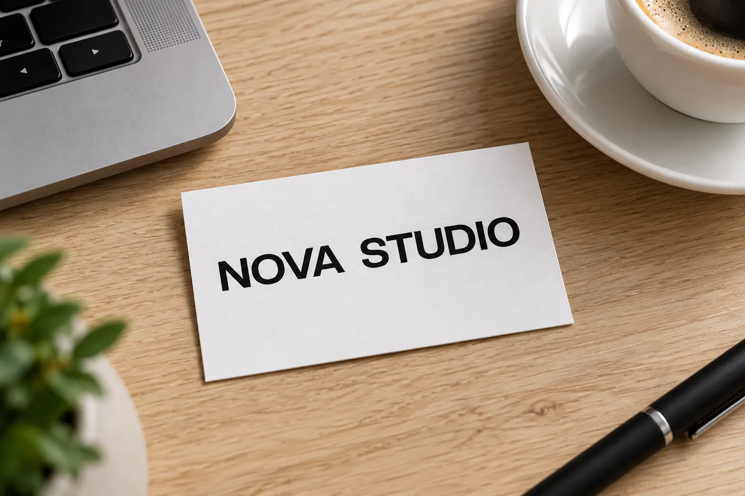 Creato Display font on a tech startup business card reading NOVA STUDIO
