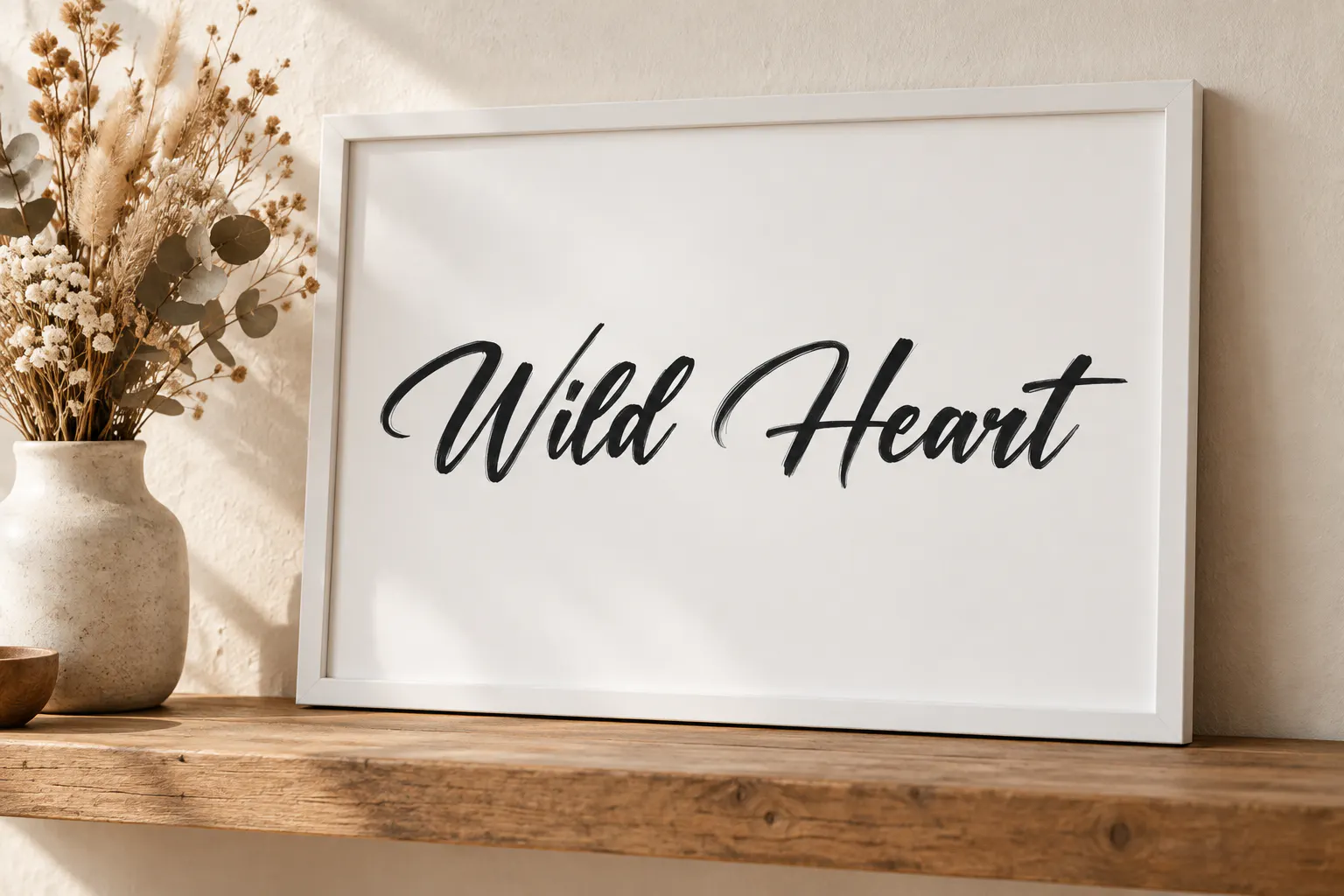 Daughter of Fortune font on a framed print reading Wild Heart