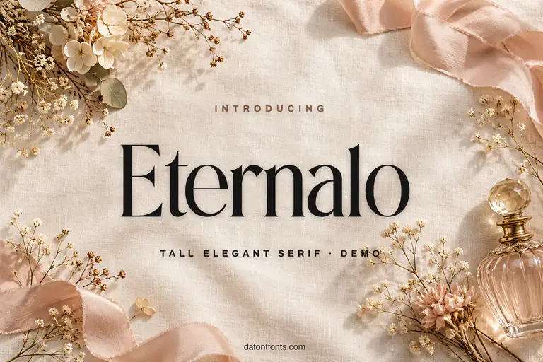 Eternalo font poster: black tall serif on an ivory background with dried flowers