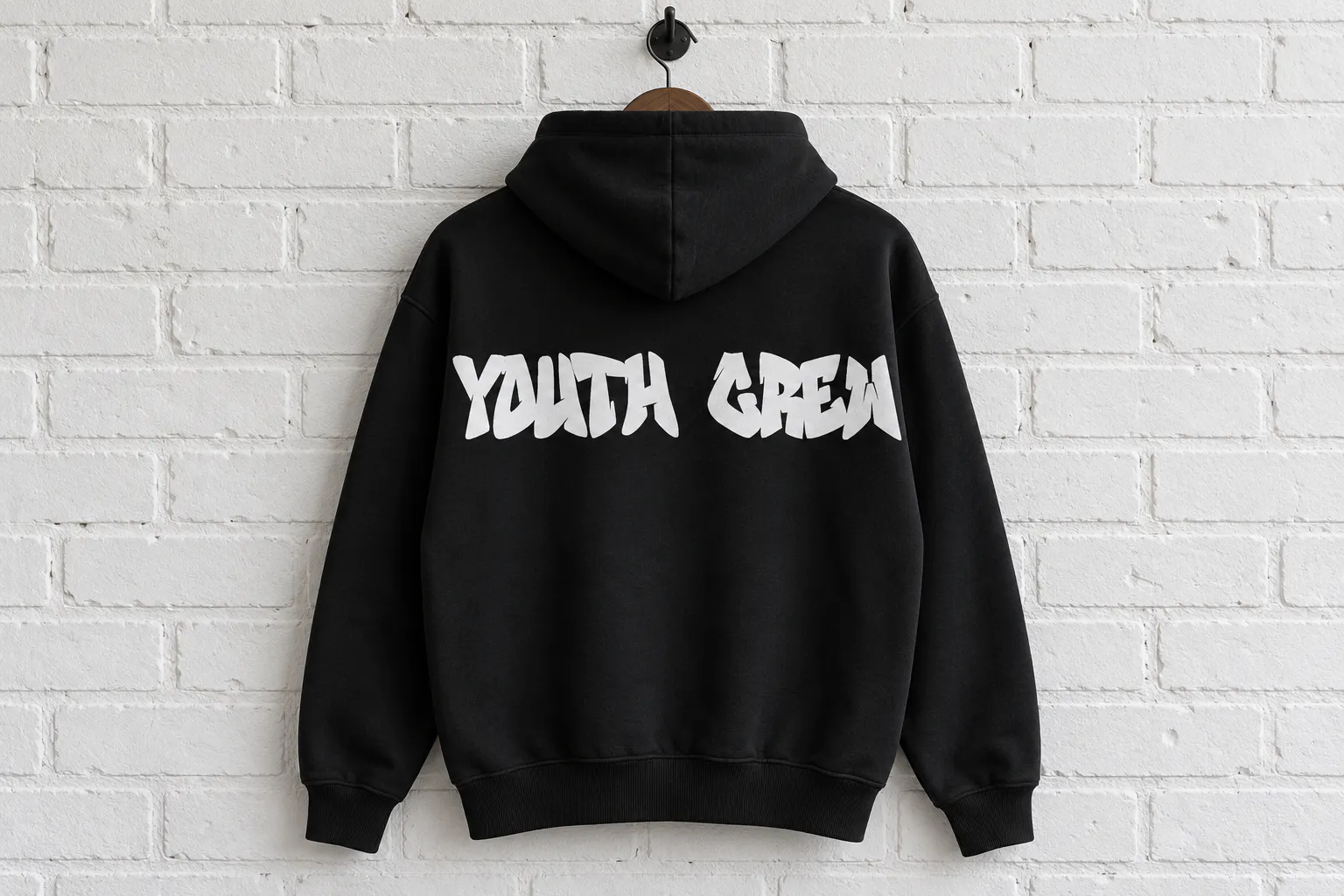 Graffiti Youth font on a black hoodie reading YOUTH CREW