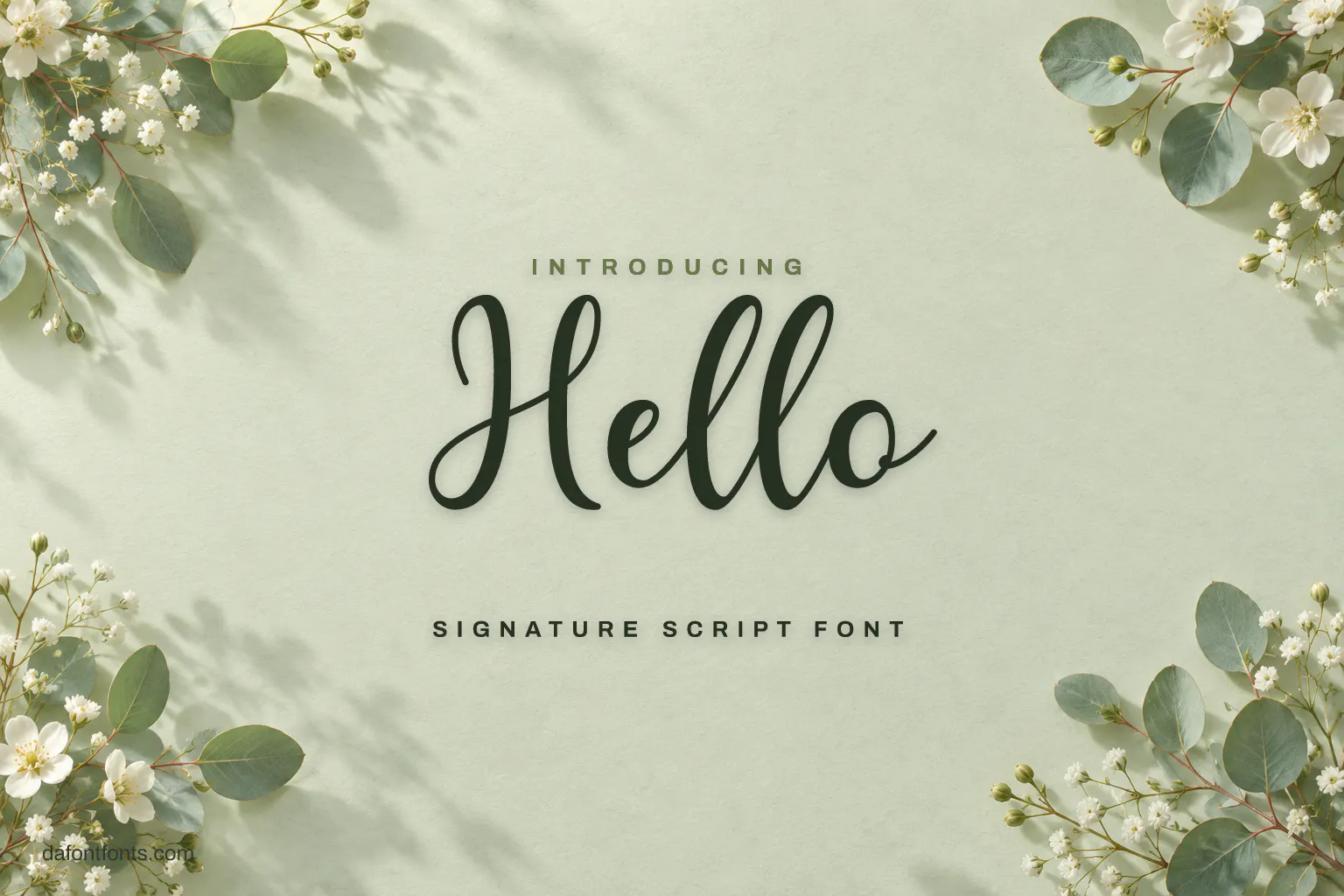 Hello font poster: thin green script on sage paper with eucalyptus