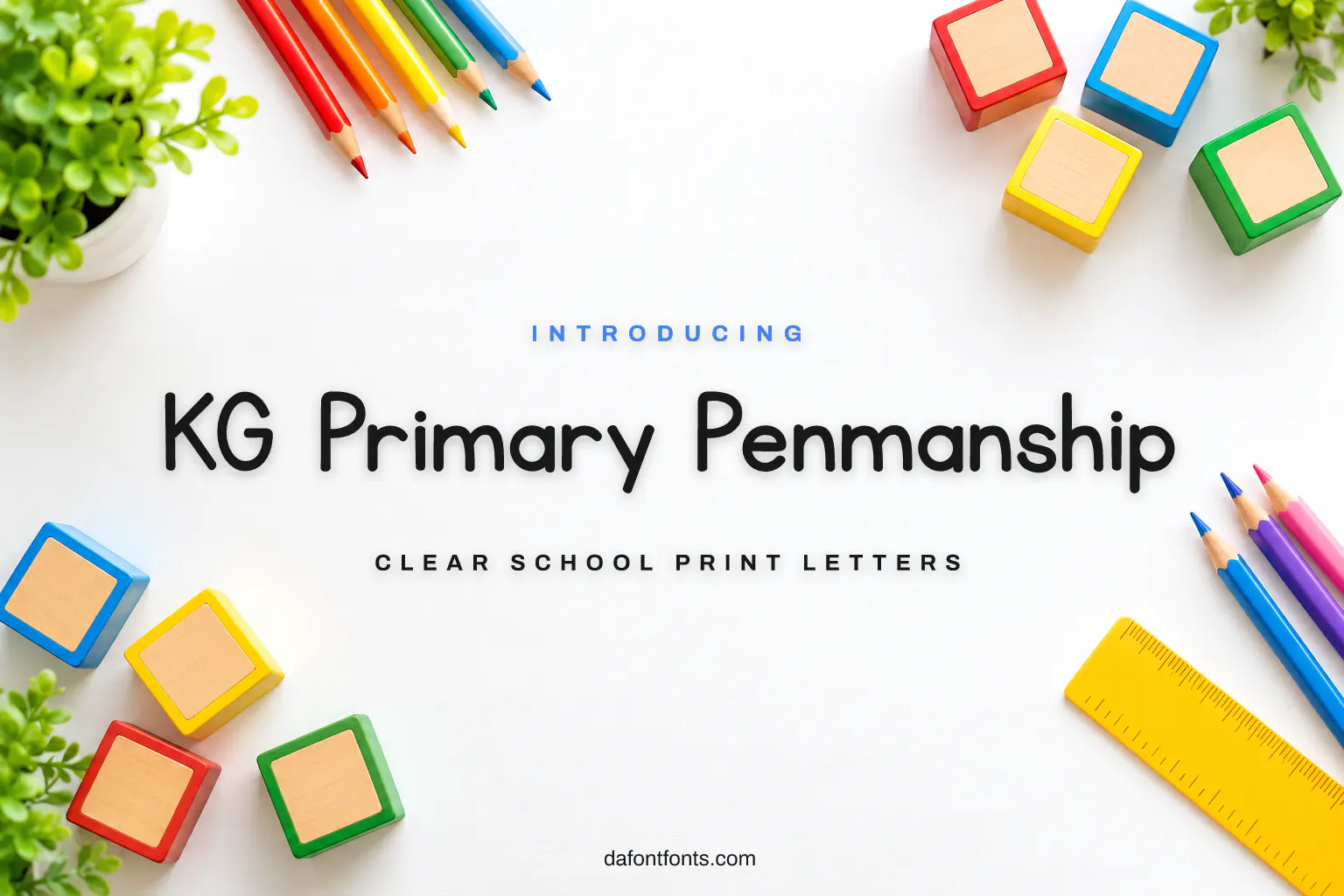 KG Primary Penmanship font poster: clear print letters on a white classroom desk with pencils