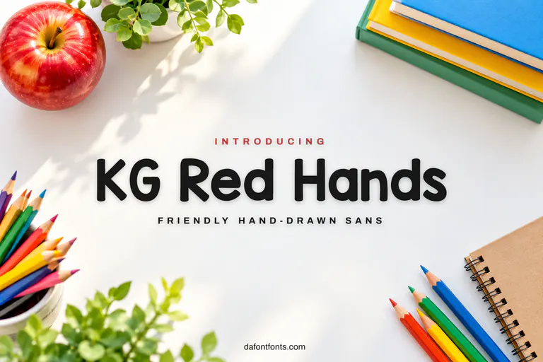 KG Red Hands font poster: black hand-drawn letters on a white desk with an apple and colored pencils