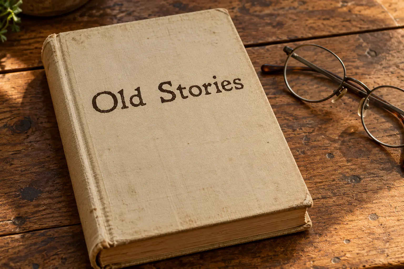 Leander font on an old book cover reading Old Stories