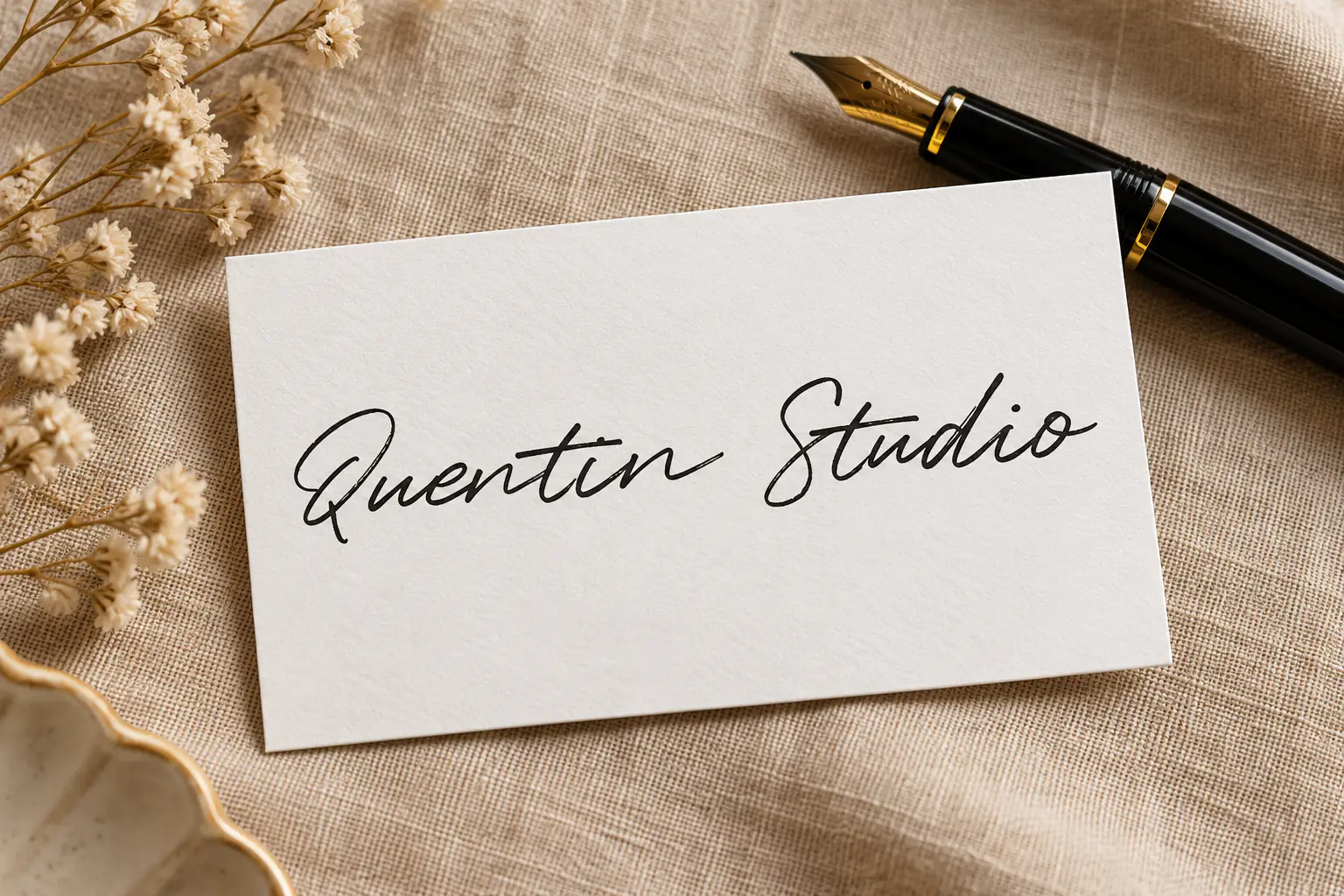 Quentin font on a business card reading Quentin Studio