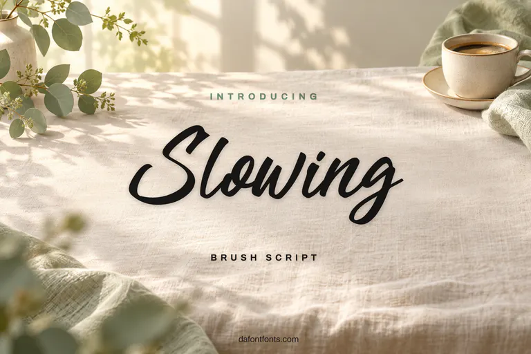 Slowing font poster: black brush script on a calm linen background with a coffee cup