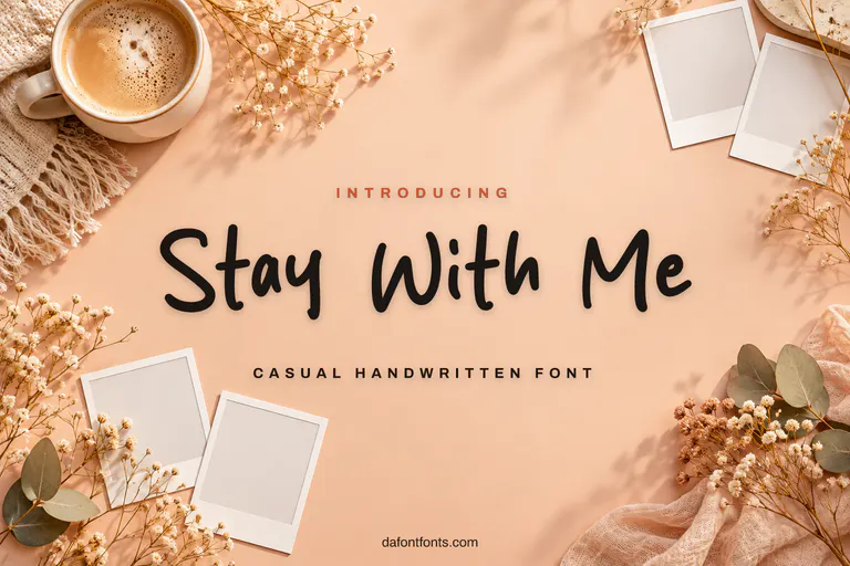 Stay With Me font poster: black handwriting on a soft peach background with a coffee mug and polaroids