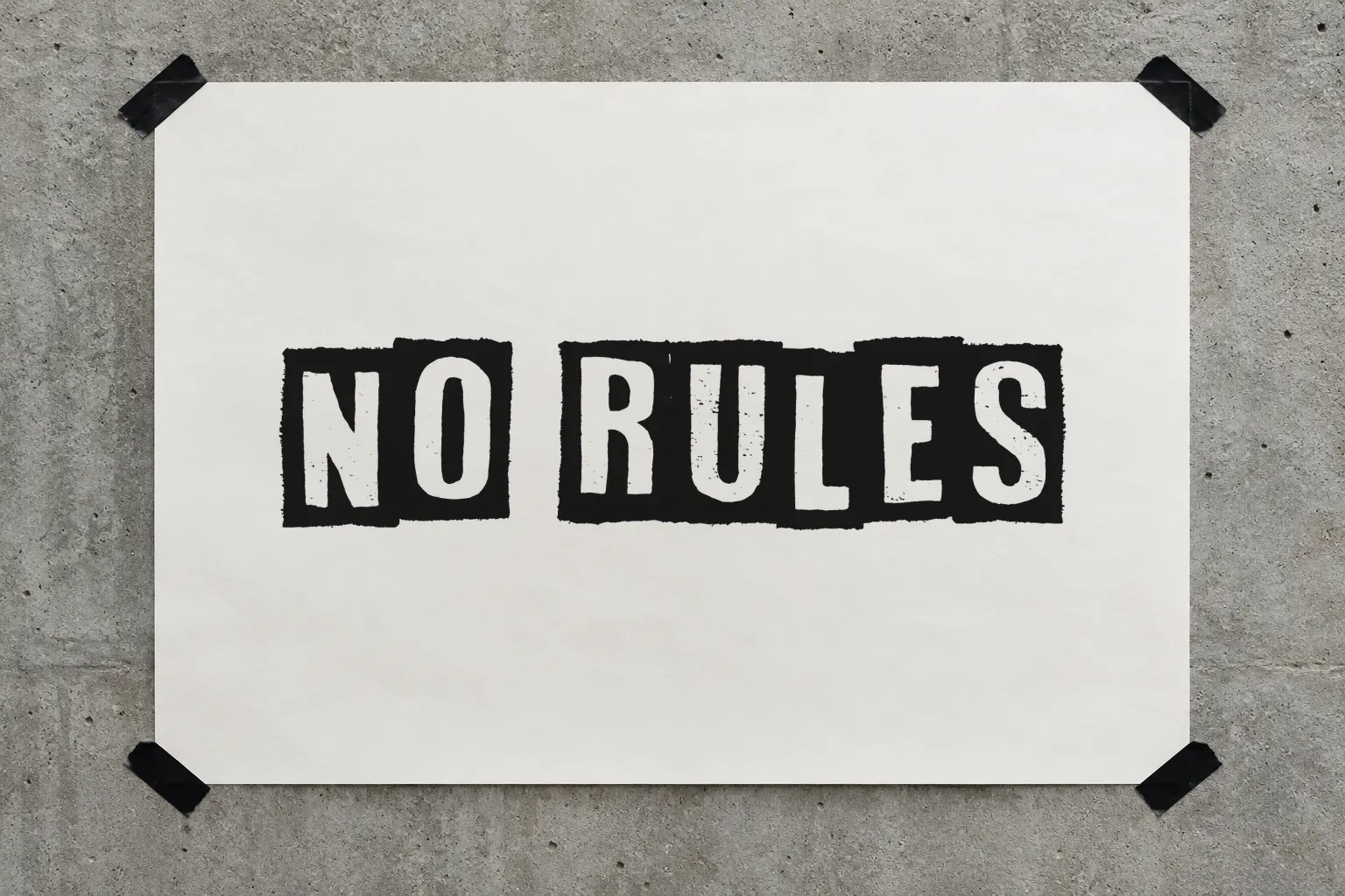 White On Black font on a taped poster reading NO RULES