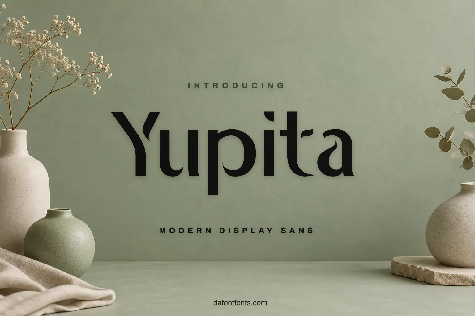 Yupita font poster: black display letters on a sage green background with ceramic vases